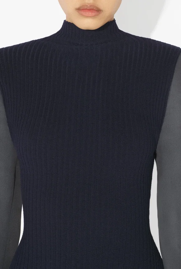 De Bi-Material Bodysuit De Bi-Material Bodysuit