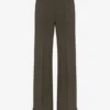 De broek met knoopsgaten De broek met knoopsgaten