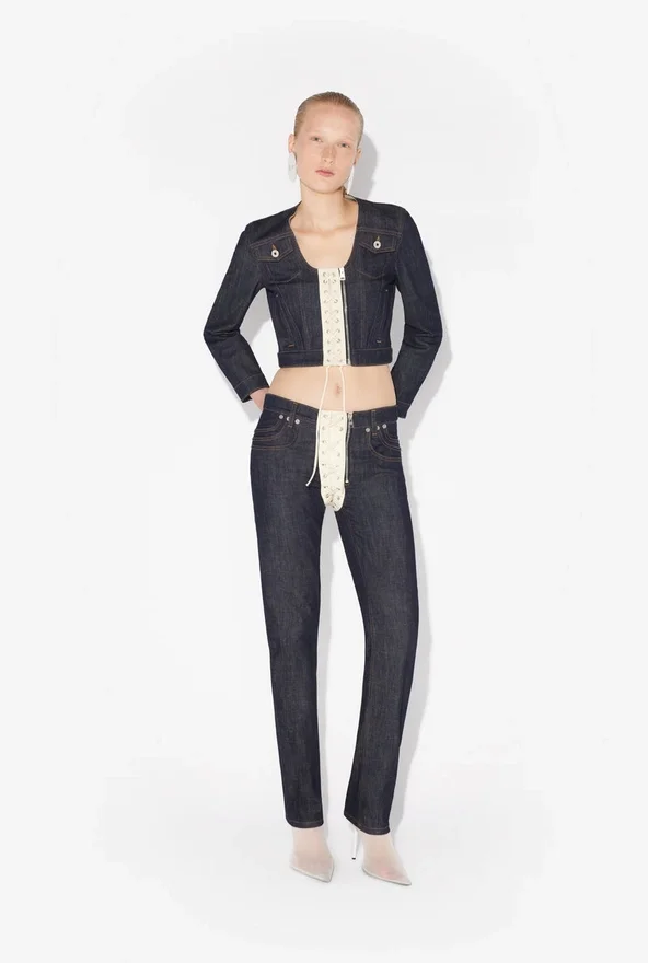 De contrasterende denim-Jeans met vetersluiting De contrasterende denim-Jeans met vetersluiting