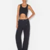 De denimjeans met drukknopen