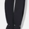 De denimjeans met drukknopen
