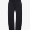 De denimjeans met drukknopen