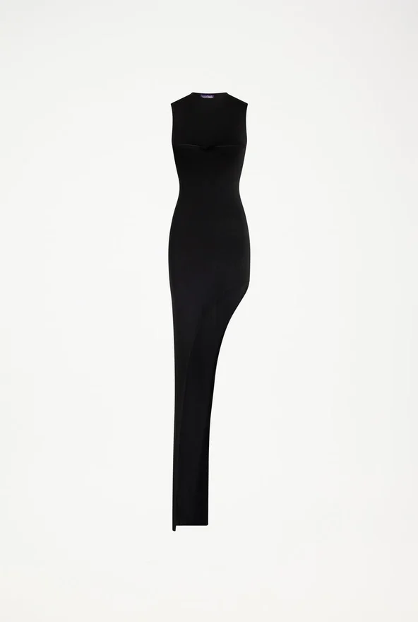 De lange asymmetrische jurk De lange asymmetrische jurk
