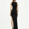 De lange asymmetrische jurk De lange asymmetrische jurk