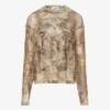 De oversized beige Madaillon-top De oversized beige Madaillon-top