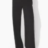 De zwarte broek met beugels De zwarte broek met beugels