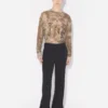 De zwarte broek met beugels De zwarte broek met beugels