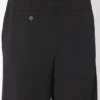 De zwarte broek met beugels De zwarte broek met beugels