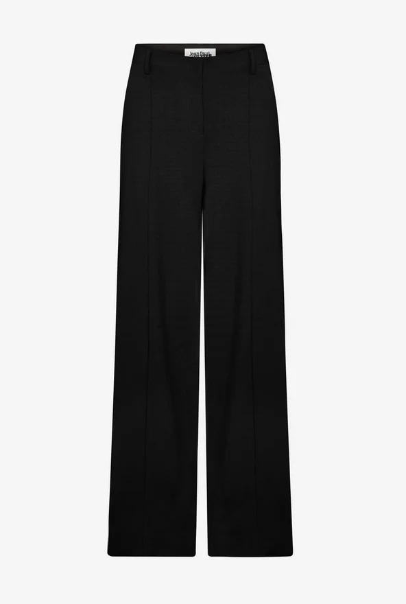 De zwarte broek met beugels De zwarte broek met beugels