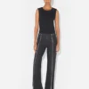 De zwarte jeans met rits