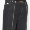 De zwarte jeans met rits