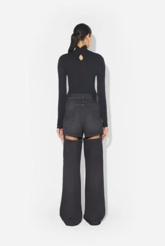 De zwarte Jeans met uitsnijdingen