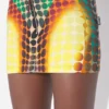 Heruitgave – de bruine mini-rok met stippen