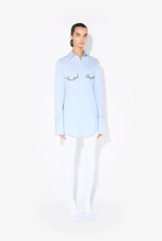 Het blauwe overhemd met Jean Paul Gaultier-print