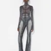 Re-Edition – de mesh top met zwart-witte stippenprint Re-Edition – de mesh top met zwart-witte stippenprint